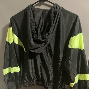 Black with neon green straps. Tag has been cut out. It’s a juniors x-small.